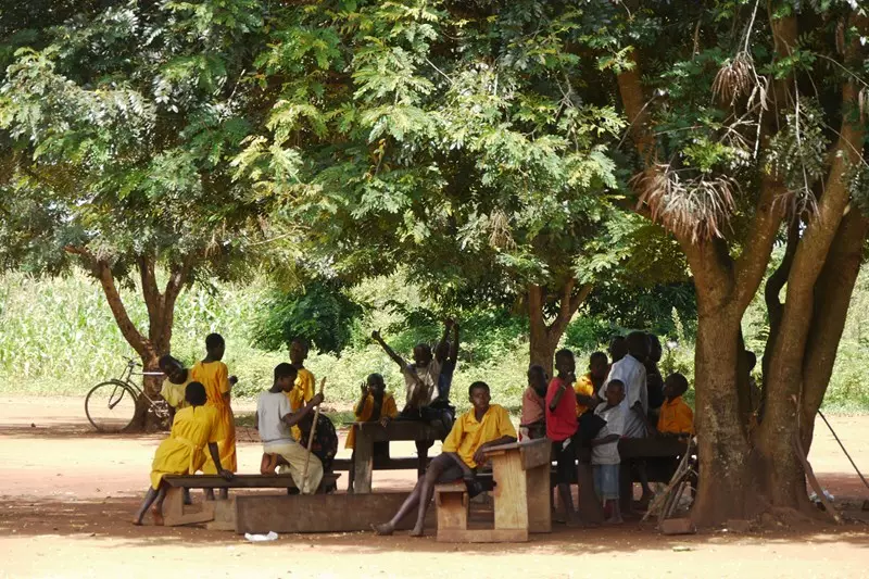 students at St Mulumbas enjoy the shade