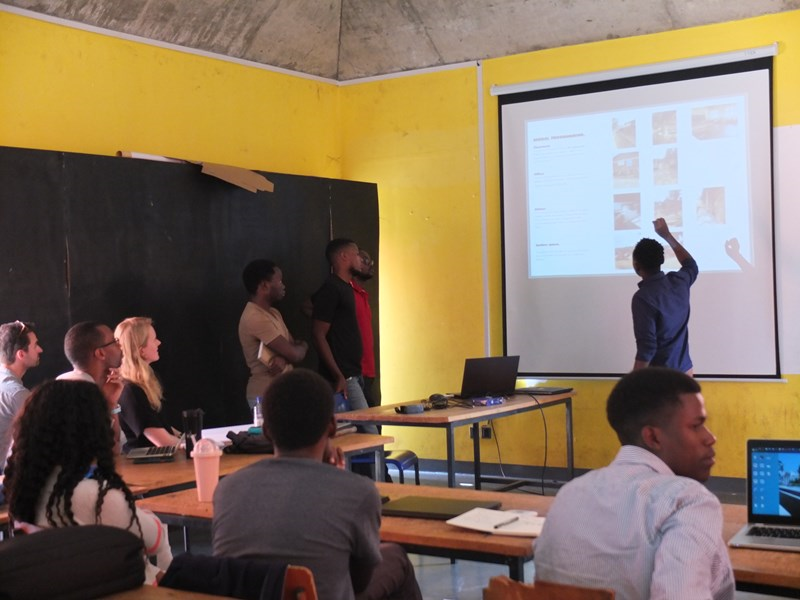 Students present their work at workshops in Uganda for the School Design Guide