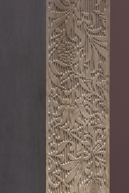 Cast concrete with arts and crafts textile pattern on MSA column. 